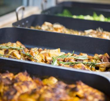 Trays of roasted food
